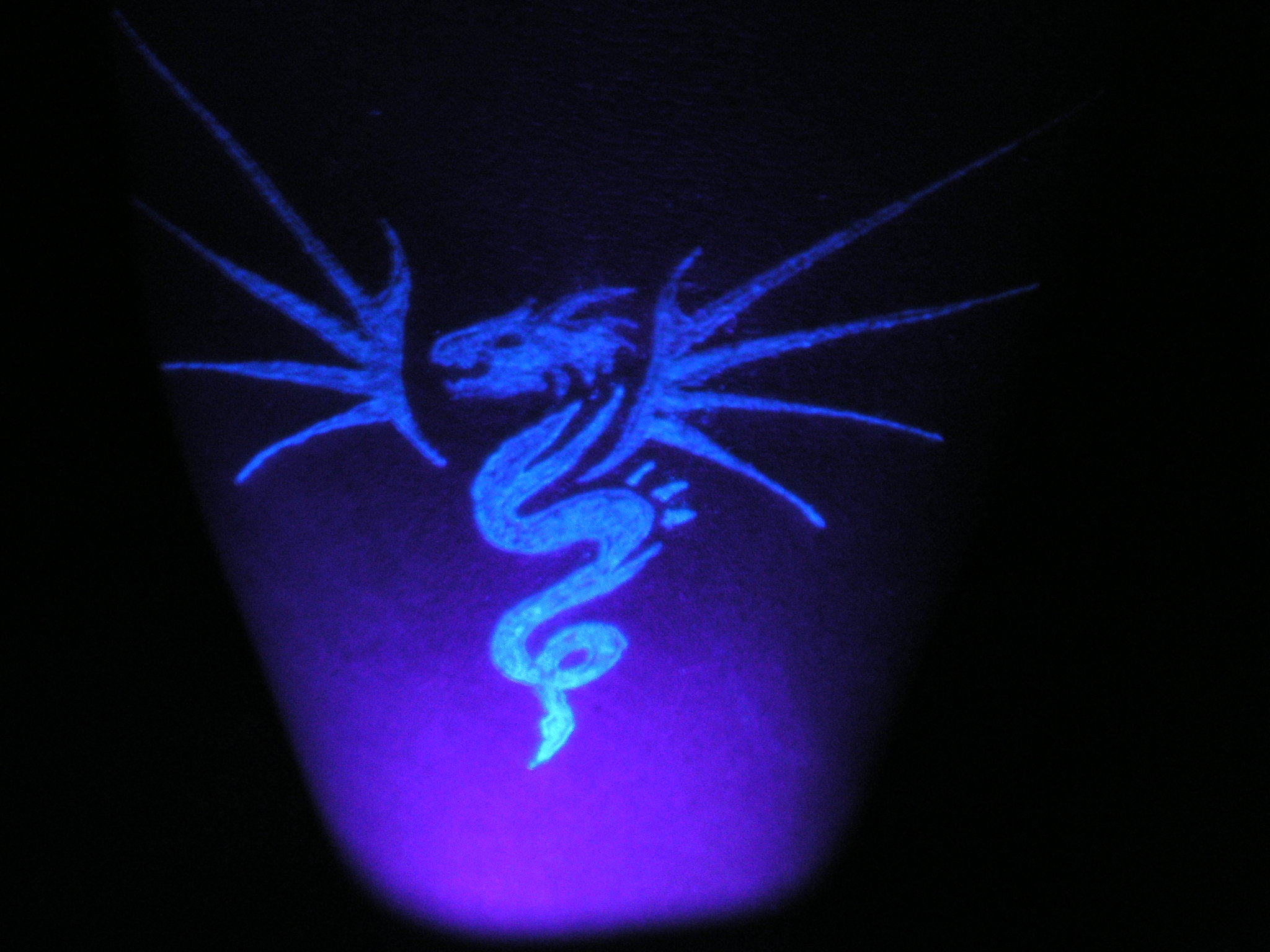 Tattoo Artist Uses Ink That Reacts To UV Light